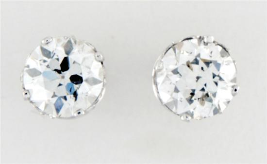 Pair diamond stud earrings two