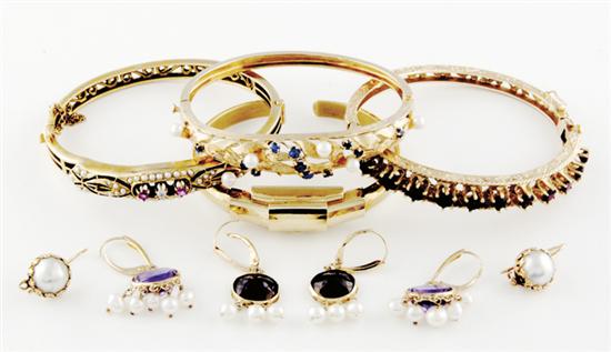 Collection of gem set gold bangles 135c35