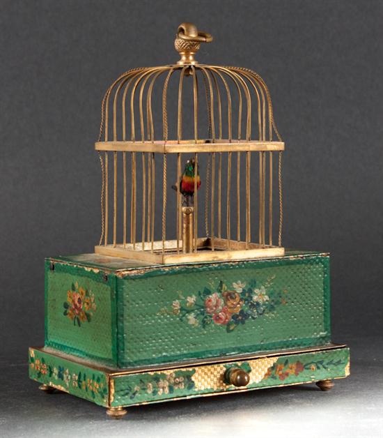 Painted gilt-metal bird-in-cage