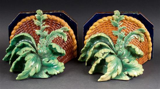 Pair of majolica wall brackets after