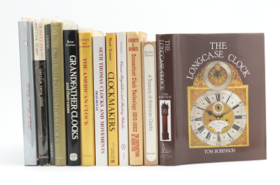 Twelve Clock Reference Books Lot