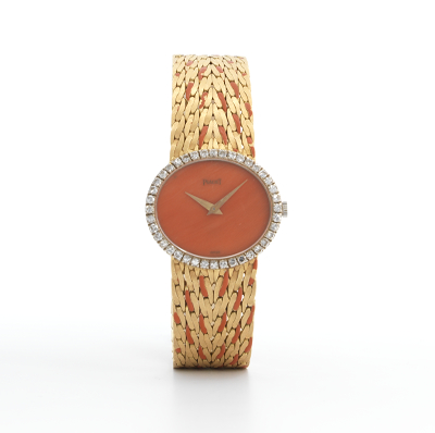 A Piaget Gold Diamond and Coral 133a54