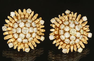 A Pair of Gold and Diamond Earrings
