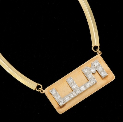 A Ladies Gold and Diamond Initials