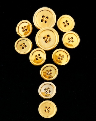 A Set of Eleven 14k Gold Jacket Buttons