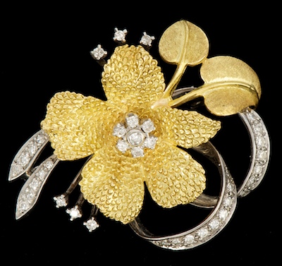 A Gold and Diamond Flower Brooch