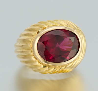 A Ladies' 18k Gold and Rhodolite