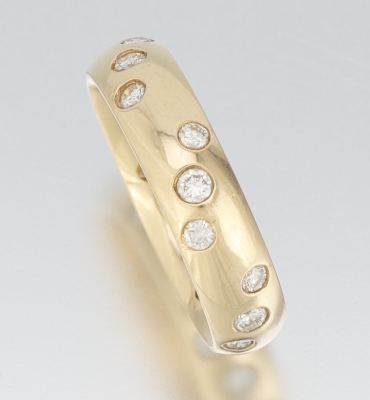 A Ladies' Diamond Etoi Style Ring