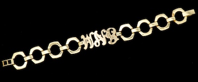 A Ladies' Gold Monogram Bracelet