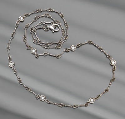 A Ladies' Gold and Diamond Chain