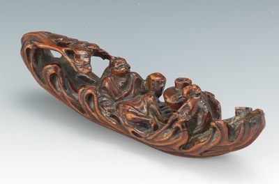 A Carved Wood Brush Rest Carved