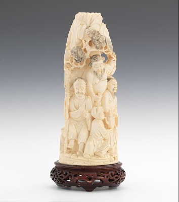 A Carved Ivory Figural Carved depicting
