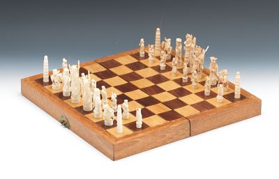 A Carved Ivory Chess Set A complete 133c56