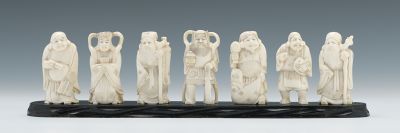 A Group of Seven Carved Ivory Immortals 133c6d