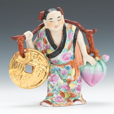 A Glazed Ceramic Figure of Good Luck