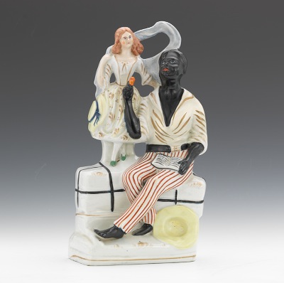 A Uncle Tom & Eva Figural Situated on