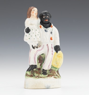 A Miniature Uncle Tom & Eva Figural