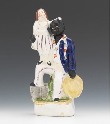 A Figural of Uncle Tom & Eva With seated