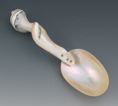 A Mother of Pearl Serving Spoon