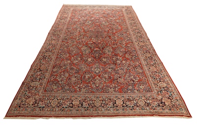 A Large Persian Sarouk Carpet Red