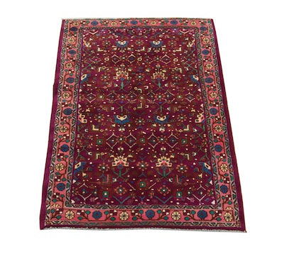 A Malayer Rug Busy geometric foliate