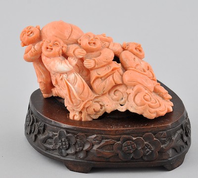 A Carved Coral Figural Carved from