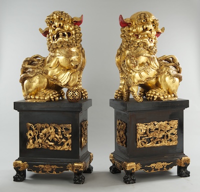 A Pair of Monumental Carved Wood Foo