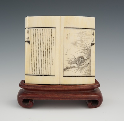 A Miniature Carved Ivory Book "Book"