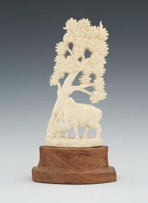 A Carved Ivory Figural of a Water