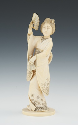 A Carved Ivory Figurine of a Dancing