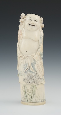 A Carved Ivory Figural The happy figure