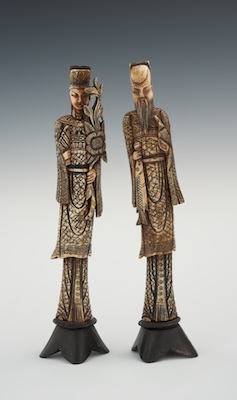 A Pair of Bone Carved Figures Made in