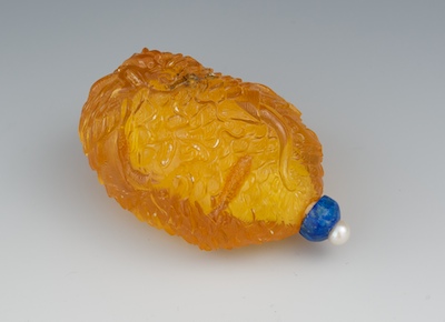 A Carved Amber Snuff Bottle Chinese