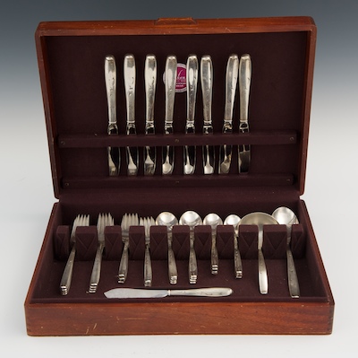 A Sterling Silver Dinner Service for