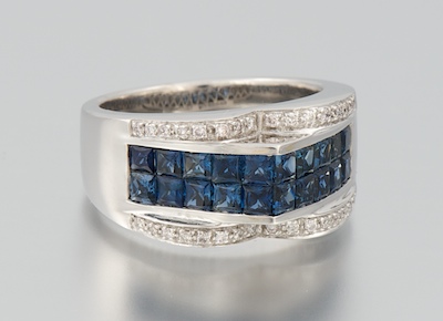 A Ladies' Invisibly Set Sapphire