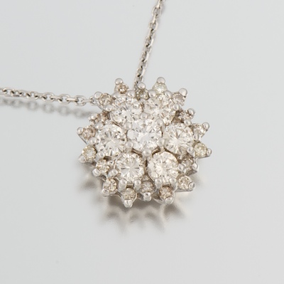 A Ladies Diamond Cluster Pendant 1340c5