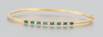 A Ladies Emerald and Diamond Bangle 1340db