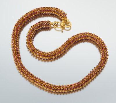 A High Karat Gold and Corundum Necklace