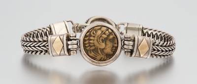 A Sterling Silver and Roman Coin Bracelet