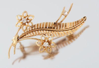 A Ladies' Rose Gold Brooch Tested
