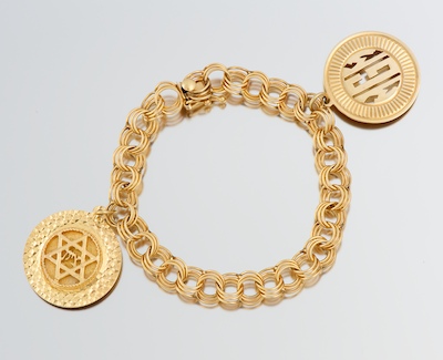 A Ladies' Gold Charm Bracelet 14k