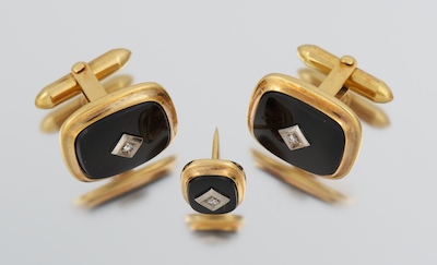 A Pair of Black Onyx and Diamond Cufflinks