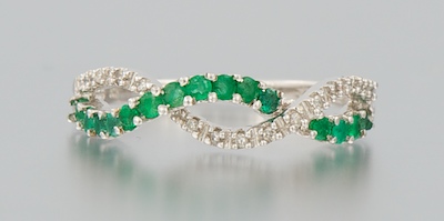 A Ladies Diamond and Emerald Ring 1341ab