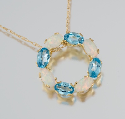 A Delicate Topaz and Opal Circle