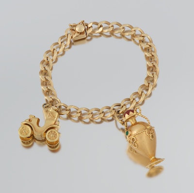 A Ladies' Bracelet with Two Charms