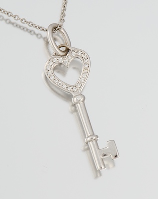 A Tiffany & Co 18k and Diamond Key Pendant