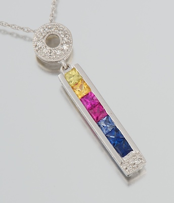 A Ladies Diamond and Sapphire Pendant