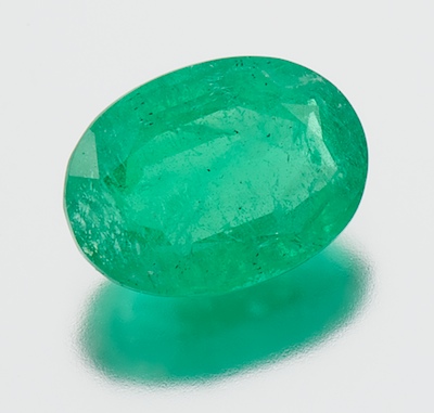 An Unmounted Emerald Oval faceted