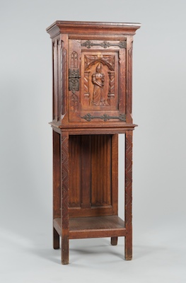 A Belgian Gothic Style Carved Wood Cabinet