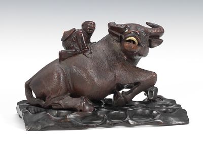 Carved Wood Ox with Child on Its